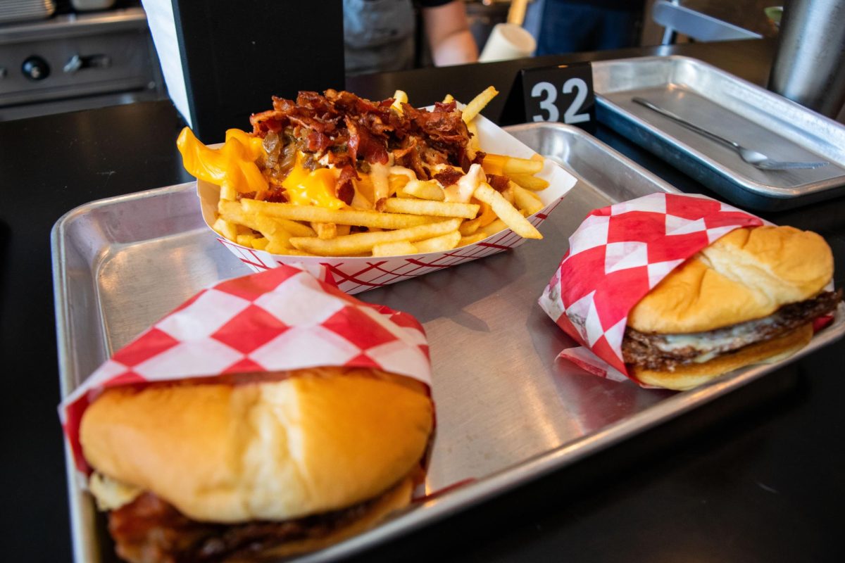 The Cowboy burger and Sloppy Goat burger with an order of loaded fries.